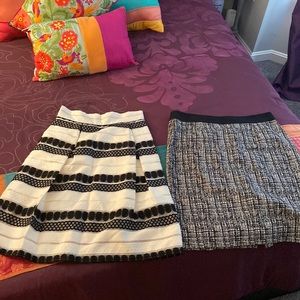 Two black and white skirts